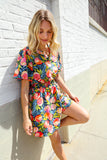 Sunny Days Floral Print Smocked Waist Back Neck Button Romper