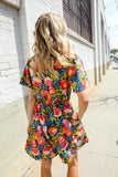 Sunny Days Floral Print Smocked Waist Back Neck Button Romper