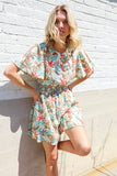 Get Whimsical Tropical Print Smocked Waist Neck Button Romper