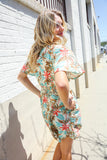 Get Whimsical Tropical Print Smocked Waist Neck Button Romper