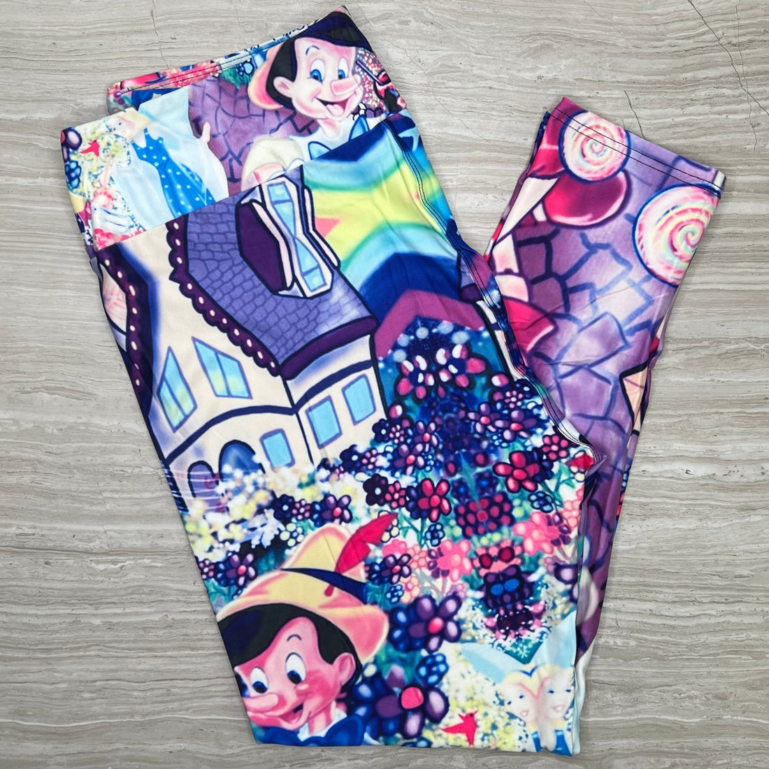 Whimsical Puppet Adventure Print Leggings - Vibrant Story Collage Comfort Stretch