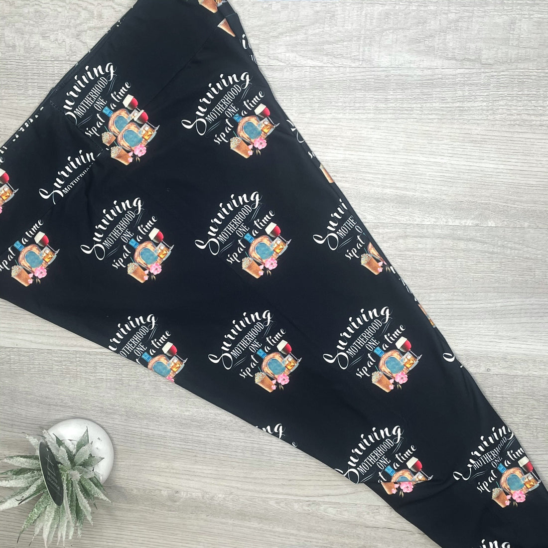 Surviving Adulthood Print Black Leggings