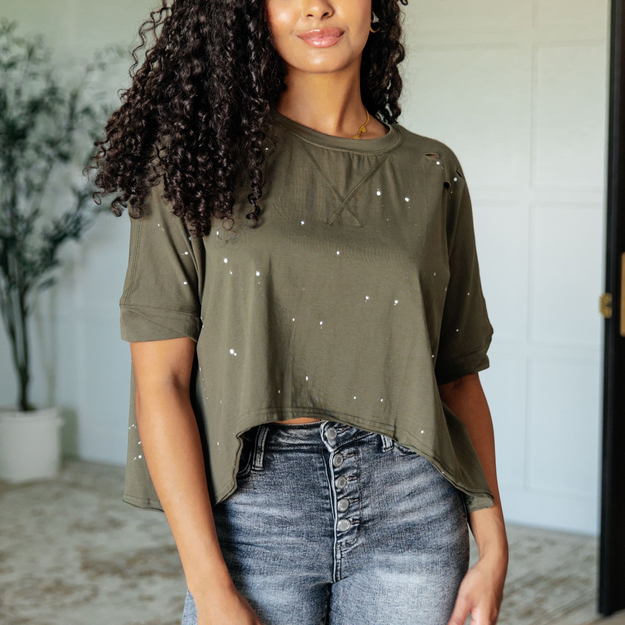 Less Than Stressed Asymmetrical Distressed Top