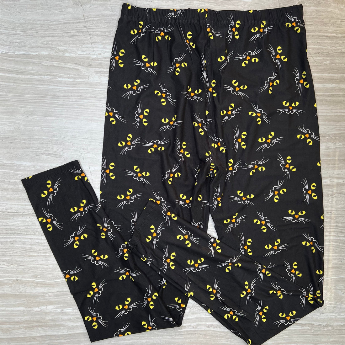 Yellow Cat Eyes Print Soft Black Leggings